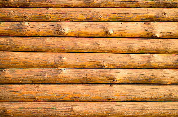 istock Log hut wooden wall background. 186255442