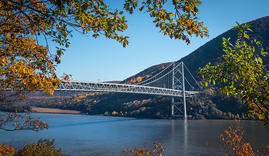 Bear Mountain Bridge crossing the Hudson river valley on an Autumn clear day.