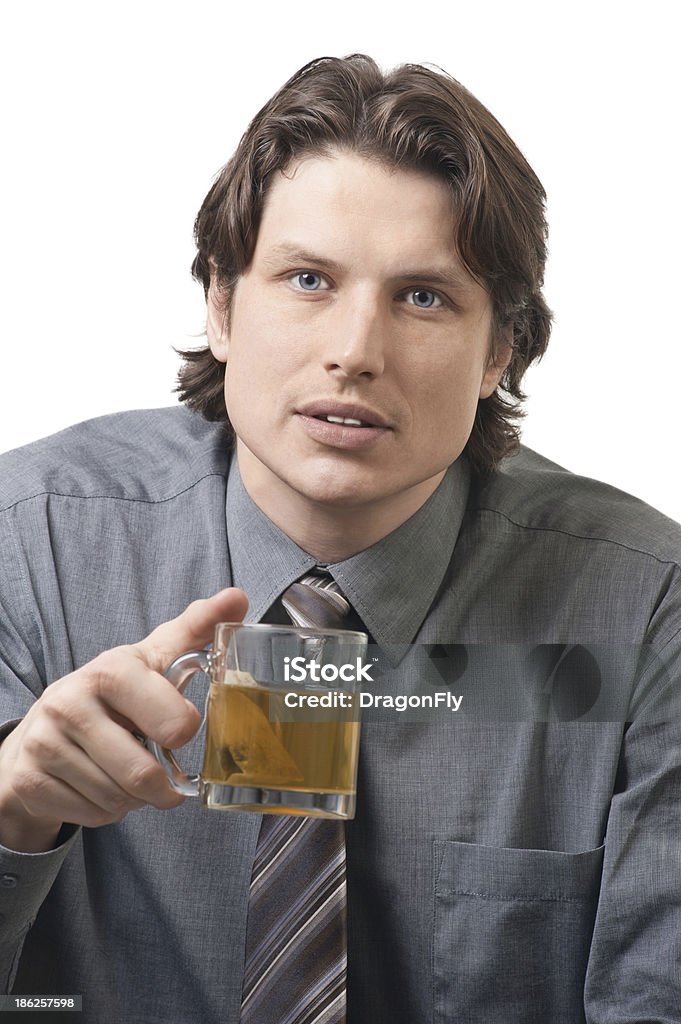 Empresario con una taza de té - Foto de stock de 20 a 29 años libre de derechos