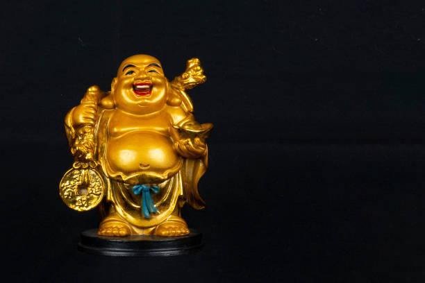 istock Buddha statue, laughing buddha statue for wealth 1862590299