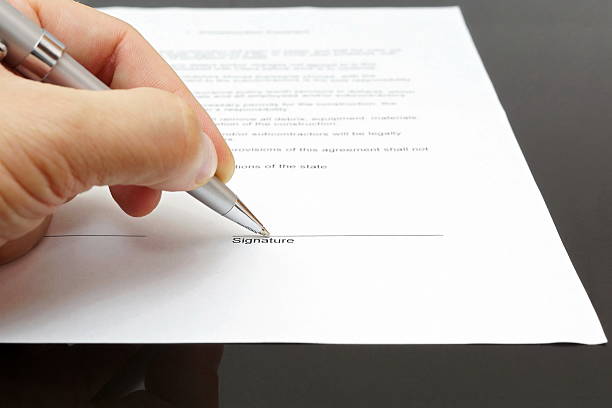 istock businessman is signing contract 186262293