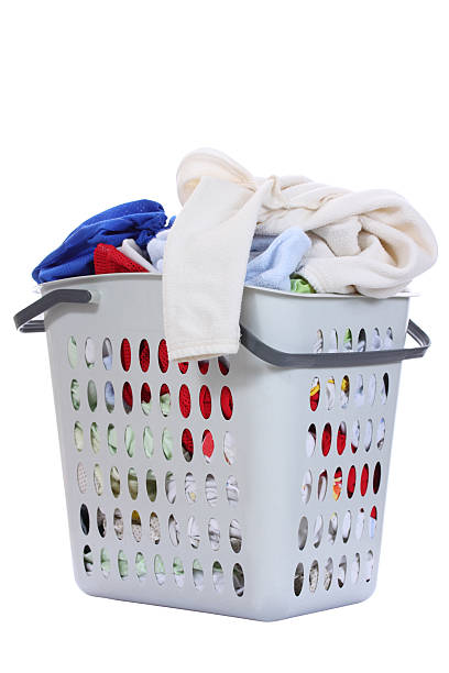 istock Baby clothes in a laundry basket , Isolated background 186264077