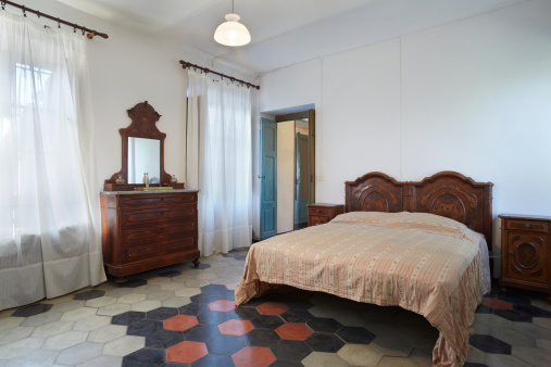Old bedroom in country house in Italy