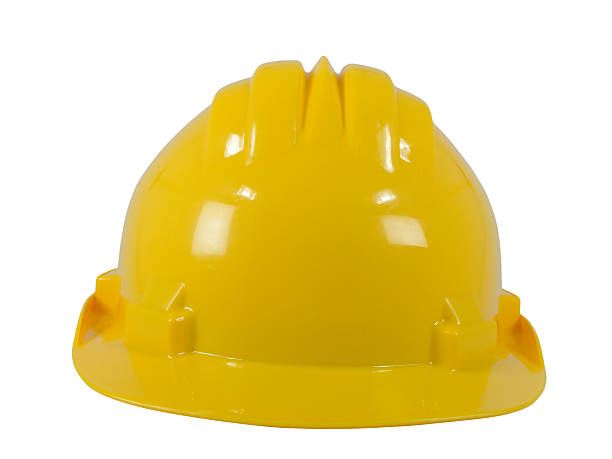 istock New yellow hardhat isolated on white background 186265629