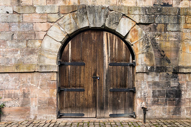 Very large old pair of doors, Ironbridge, UK stock photo