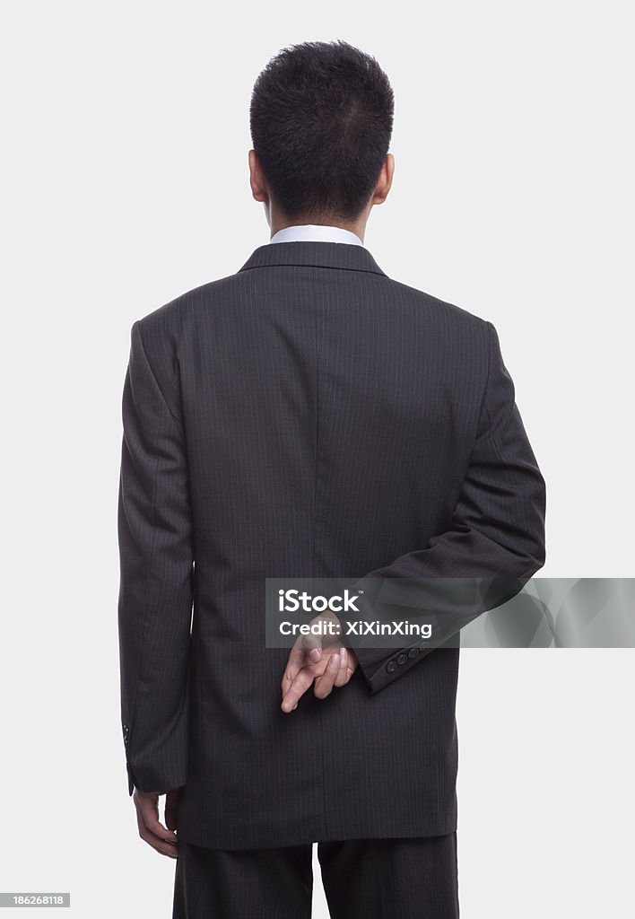 Homem de negócios com os Dedos Cruzados - Royalty-free Dedos Cruzados Foto de stock