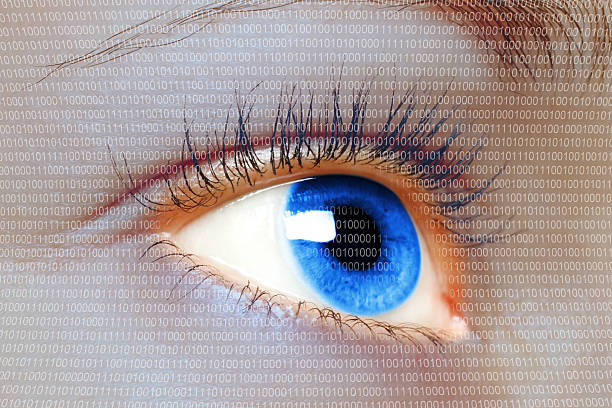 istock Woman blue eye looking on digital virtual screen 186268537
