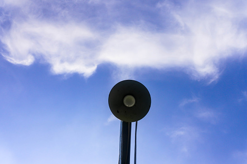 Solitary Illumination: Beacon on Concrete