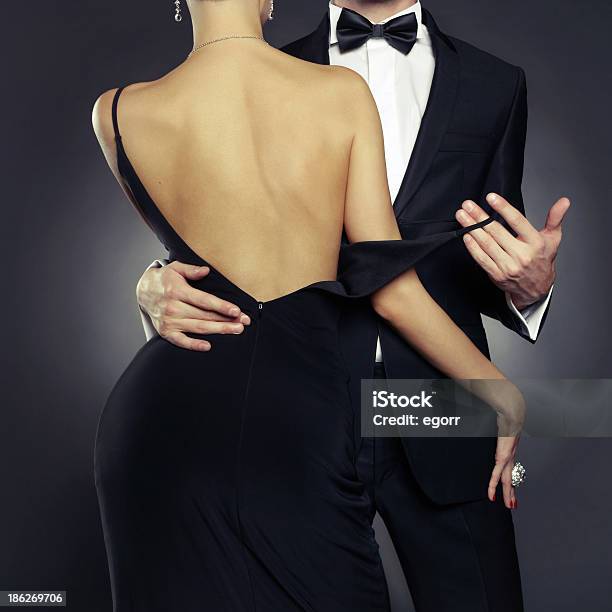 Sensual Couple In Formal Attire Stock Photo - Download Image Now - Women, Rear View, Naked