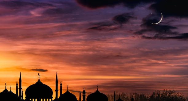 istock Islamic Background, Silhouette Mosques Dome,Crescent Moon on Dusk Sky Twilight,Landscape Sunset Sky,Symbols for Islamic religion on Ramadan Kareem,Eid Al Fitr,Eid Al Adha,Eid Mubarak,Muharram,Mawlid 1862713901