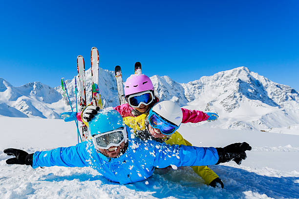 istock Ski family enjoying winter. 186271680