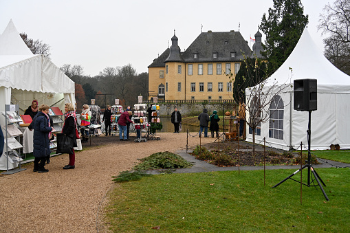 Juechen, Germany, December 16, 2023 - Christmas market (Schlossweihnacht) at Dyck Castle.