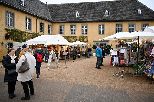 Juechen, Germany, December 16, 2023 - Christmas market (Schlossweihnacht) at Dyck Castle.