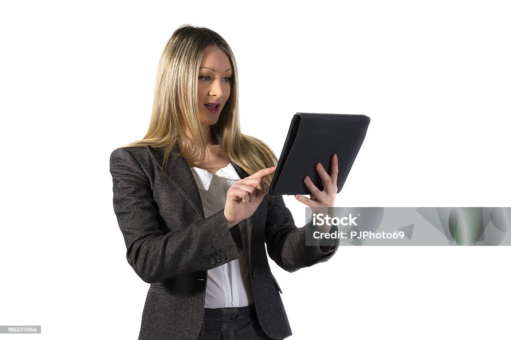 Young businesswoman using digital tablet Young businesswoman using digital tablet isolated on white Adult Stock Photo