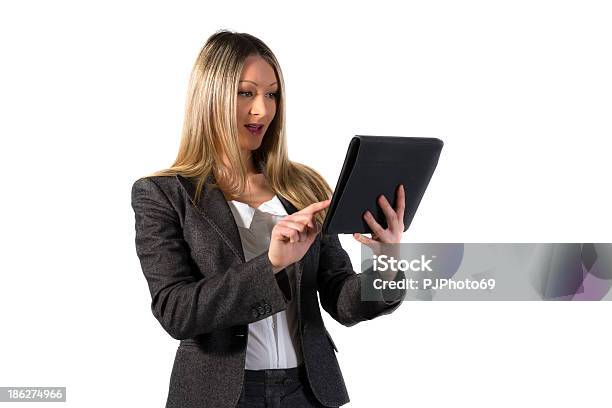 Young Businesswoman Using Digital Tablet Stock Photo - Download Image Now - Adult, Adults Only, Beautiful Woman
