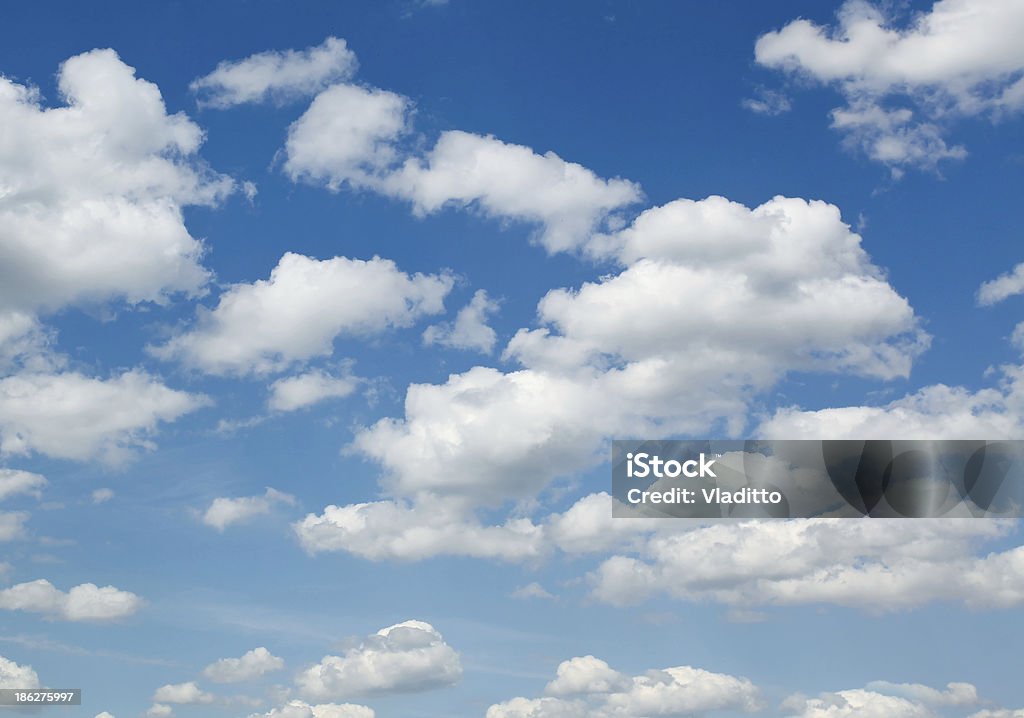 White sparse clouds over blue sky Backgrounds Stock Photo