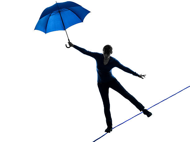30+ Tightrope Walker Silhouette Tightrope Risk Stock Photos, Pictures &  Royalty-Free Images - iStock