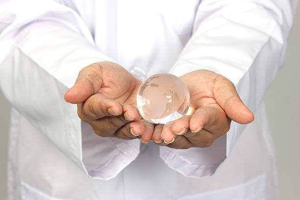 istock globe in hand woman 186278199
