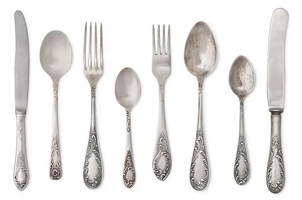vintage old cutlery isolated on white background