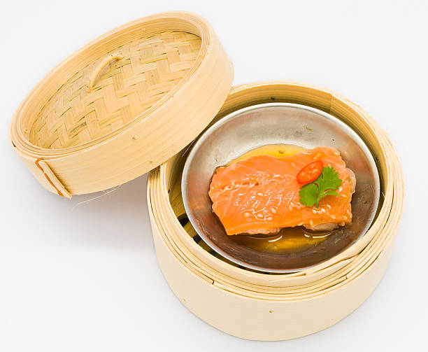istock Chinese steamed dim sum salmon fish in bamboo container 186281222