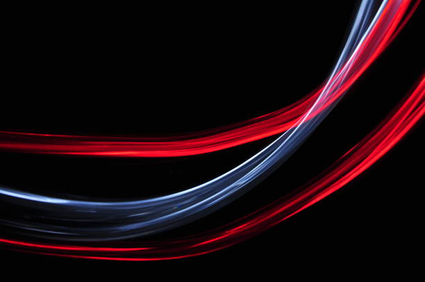 istock blue white red lines trace on black background 186282524