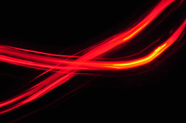 istock red orange lines trace on black background 186282535