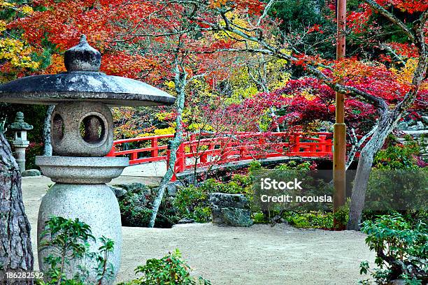 Lantern Bridge And Autumn Colours In Miyajima Japan Stock Photo - Download Image Now