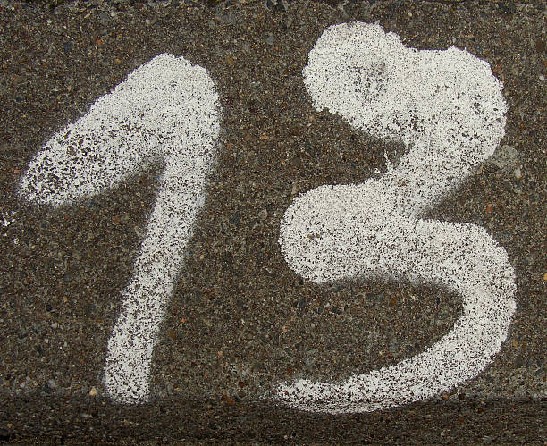 istock the number 13 sprayed with white color on stone 186283207