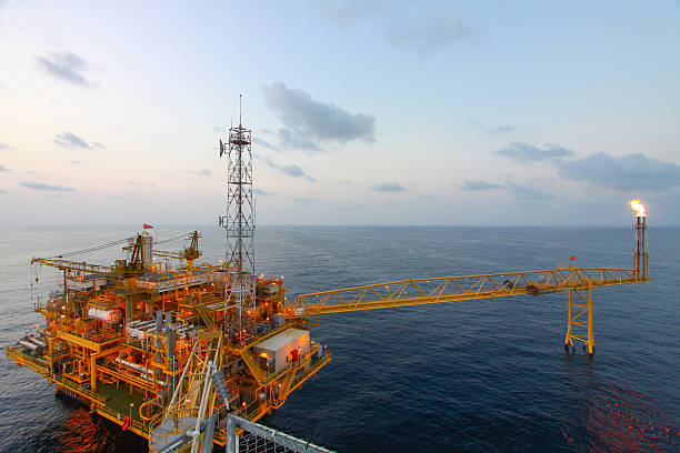istock Oil and gas platform in sunset or sunrise time 186285544