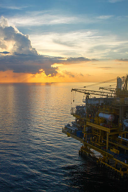 istock Oil and gas platform in sunset or sunrise time 186285591