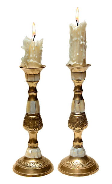 istock Two burning old candles in Golden candlesticks 186286518