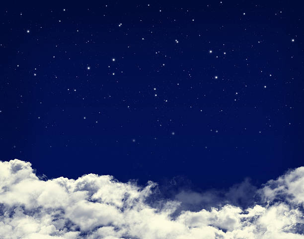 istock Clouds and stars in a night blue sky 186286676
