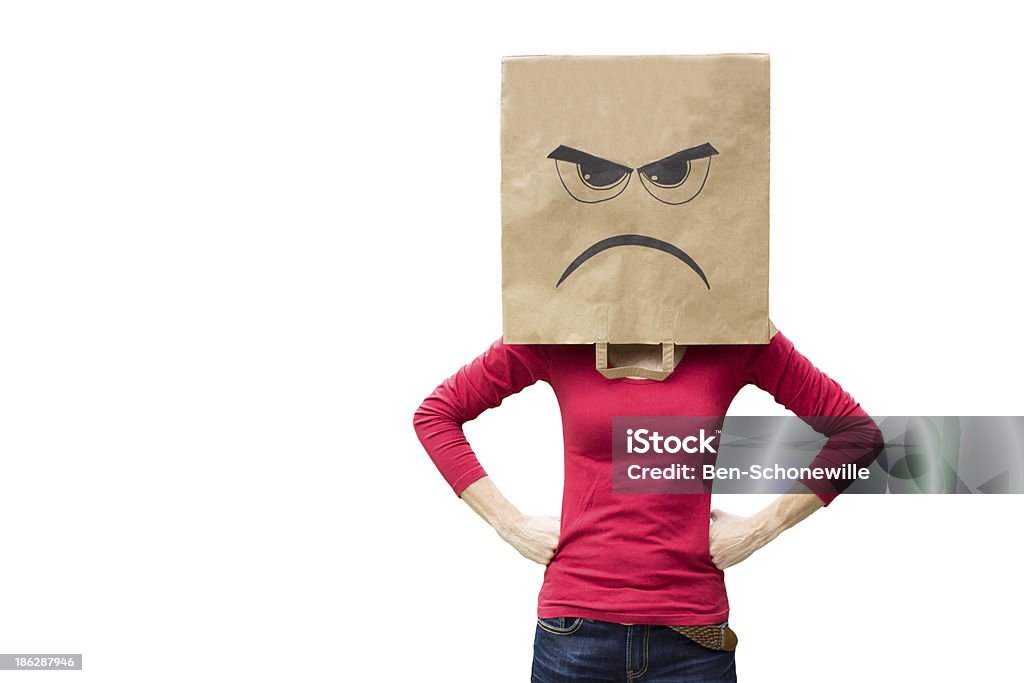 Angry woman Woman with paper bag on her head with an angry expression on it Sulking Stock Photo