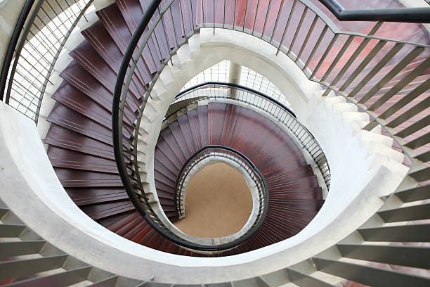 istock Upside view of a spiral staircase 186290858