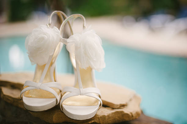 istock Fancy high heel shoes on rosks. 186291026
