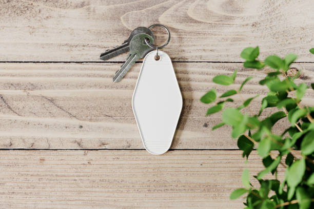 Vintage hotel keychain mockup. 3D rendering Blank vintage hotel keychain mockup. 3D rendering motel stock pictures, royalty-free photos & images