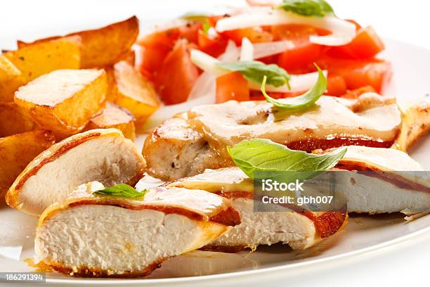 Grilled Meat And Vegetables Stock Photo - Download Image Now - Baked Potato, Barbecue - Meal, Basil