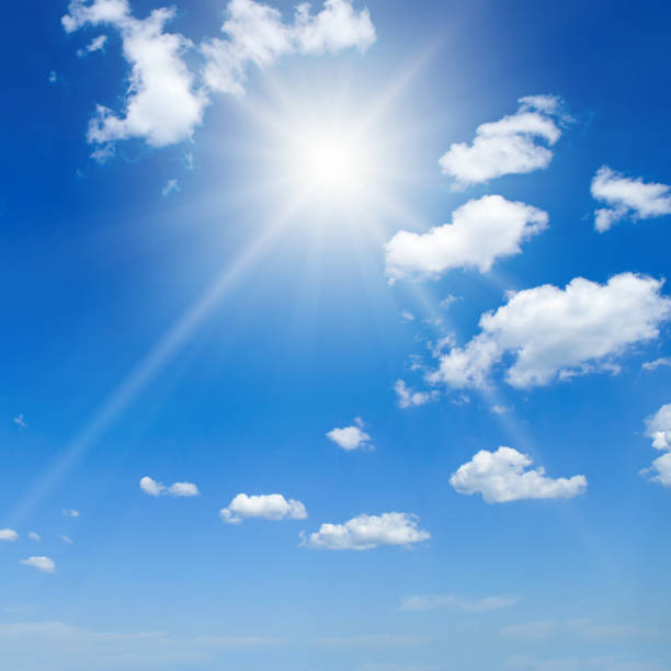 istock Cumulus clouds and bright sun in the sky. 1862928017