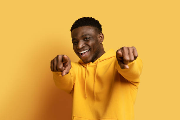 istock Positive cool young african american guy pointing at camera 1862930180