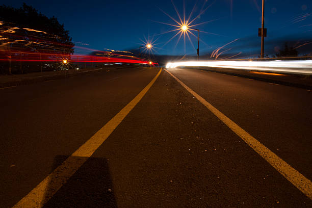 istock Centre of road at Night 186298310
