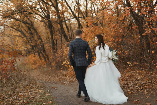 istock bride and groom enjoying romantic moments outside 1862990826