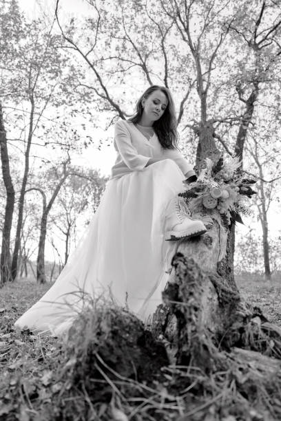istock beautiful happy bride holding wedding autumn bouquet 1862991920