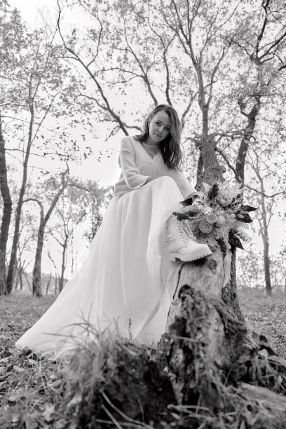 istock beautiful happy bride holding wedding autumn bouquet 1862991929