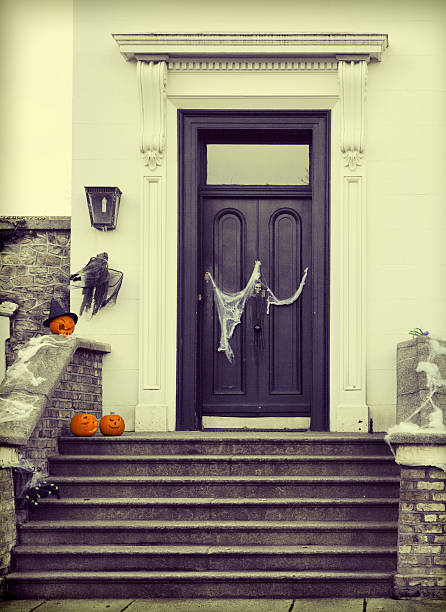 istock Halloween decoration with scary pumpkins and cobwebs 186299225