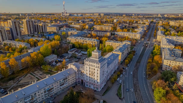 istock Soviet postwar architecture. White tower on a wide street. 1863001389