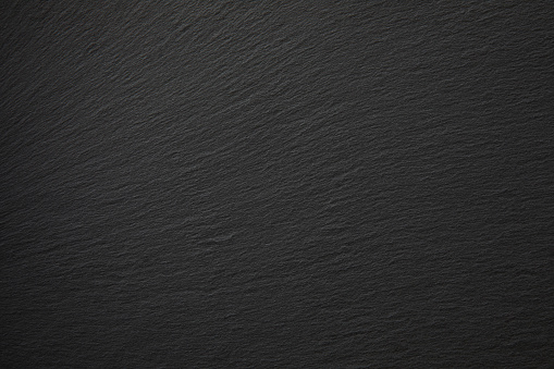 Close-up of blank slate textured background.