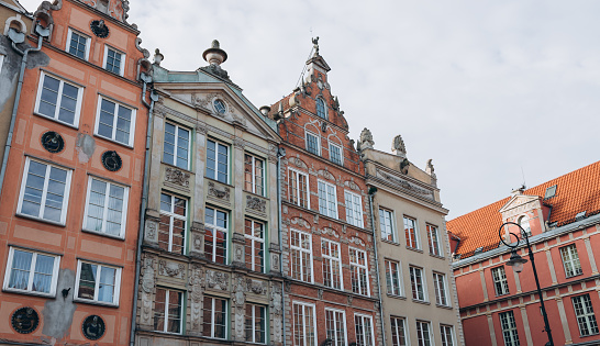Old historical colorful building architecture facade of Old Town in Gdansk. Traveling Europe in summer. Vacation banner
