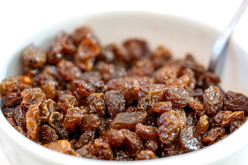 dried raisins isolated on a white background