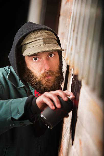 istock Sneaky Vandal Spray Painting 186307190