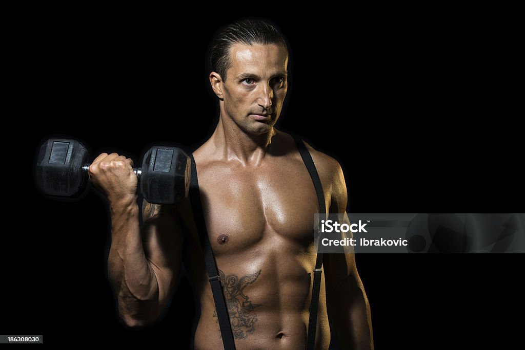 Moc mięśni mężczyzna podnoszenia ciężarów - Zbiór zdjęć royalty-free (Aktywny tryb życia)
